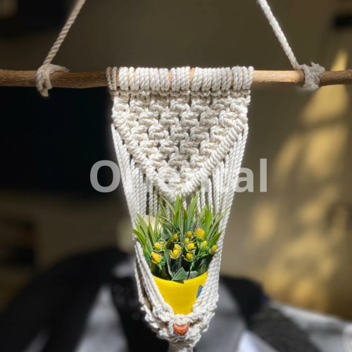 Plant holder from macrame