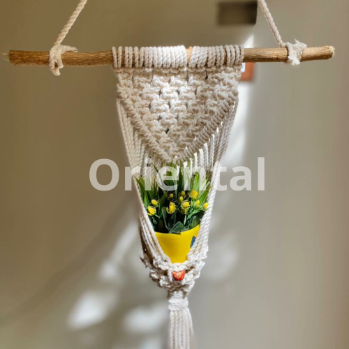 Plant holder from macrame