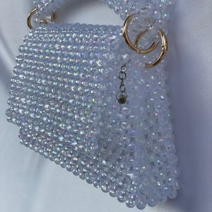 A cross bead bag and a medium-sized handbag