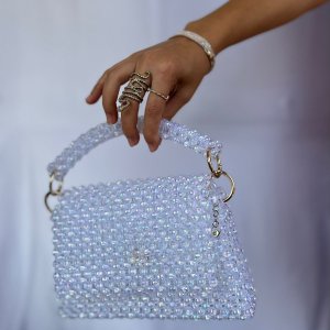 A cross bead bag and a medium-sized handbag