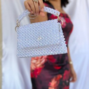 A cross bead bag and a medium-sized handbag