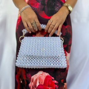 A cross bead bag and a medium-sized handbag