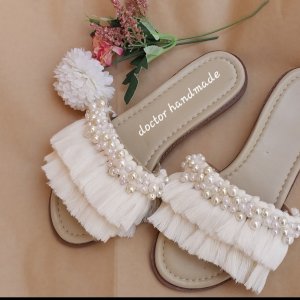 Macrame slipper decorated with Loly