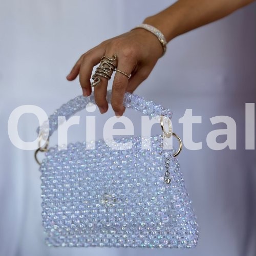 A cross bead bag and a medium-sized handbag