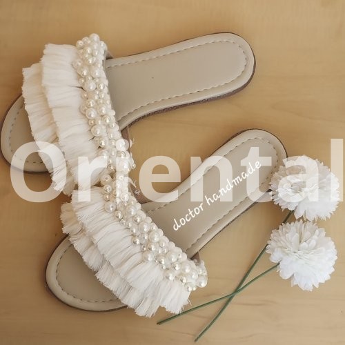 Macrame slipper decorated with Loly