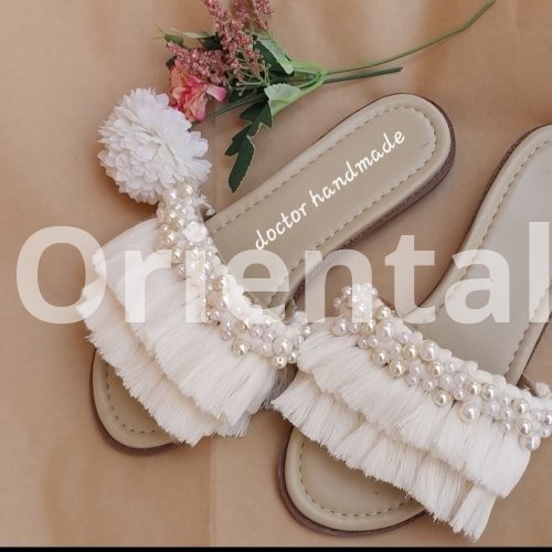 Macrame slipper decorated with Loly