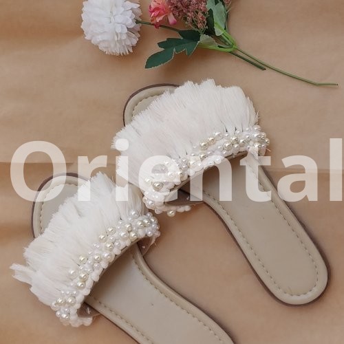 Macrame slipper decorated with Loly