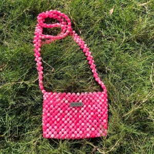 Crossbody bag with pink and white beads