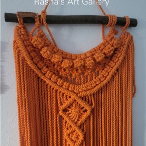 Orange macrame hanger for decoration