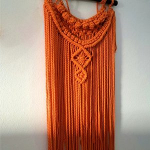 Orange macrame hanger for decoration