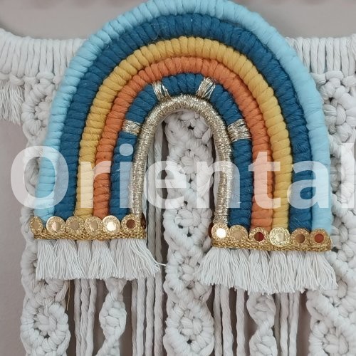 Macrame hanging  in the shape of a cloud with the child’s name