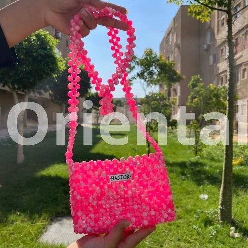 Crossbody bag with pink and white beads