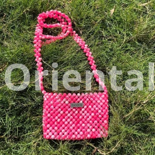 Crossbody bag with pink and white beads