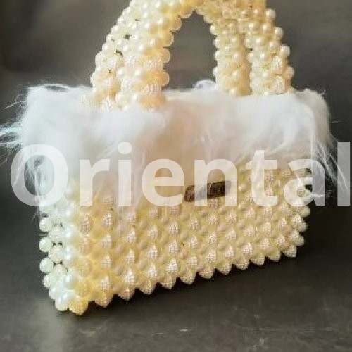 Loly handbag decorated with off white feathers