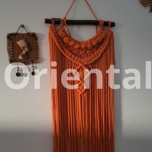 Orange macrame hanger for decoration