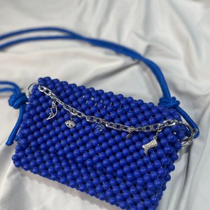 blue shoulder beaded bag with a Rope handle