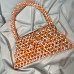 Triangular shoulder bag