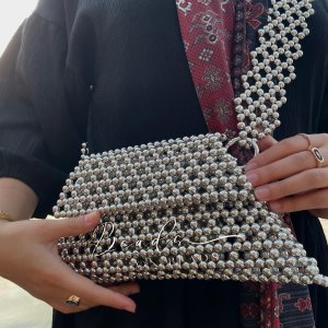 beaded triangular silver bag