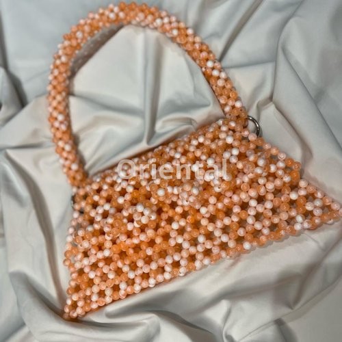 Triangular shoulder bag