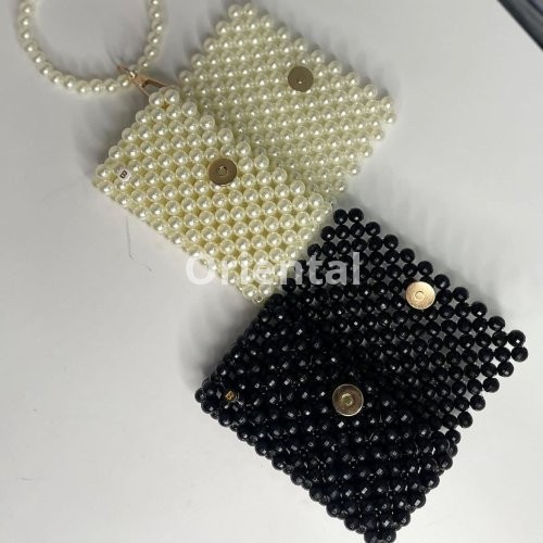 Women's black beaded wallet